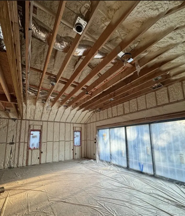 Interior walls and ceiling insulated with spray foam during new construction in Spokane